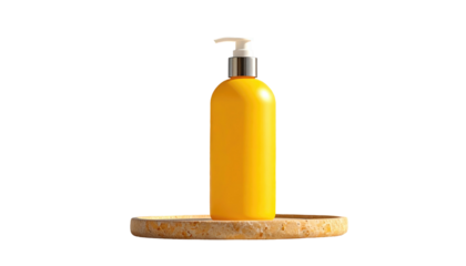 Yellow bottle with pump on stone, studio shot. Black background, simple elegant product presentation