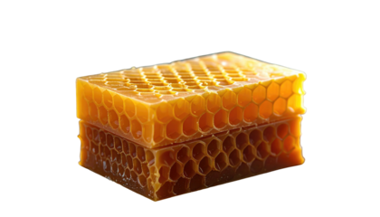 Amber-colored honeycomb block stacked on a reflective surface, against a black background