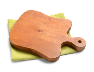 Wooden cutting board and green napkin on white background