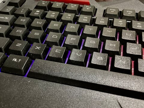 gaming keyboard with bright backlight, close up of a cool gaming keyboard