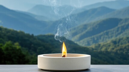 Wellness meditation detox concept. A flame flickers in a serene setting with mountains in the background.