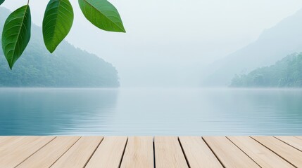 Wellness meditation detox concept. Serene landscape with calm water, mountains, and lush green leaves in a misty atmosphere.