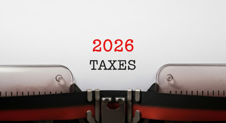 2026 business year end christmas new year tax document on typewriter with vintage ribbon and paper conveying deadline pressure and seasonal planning