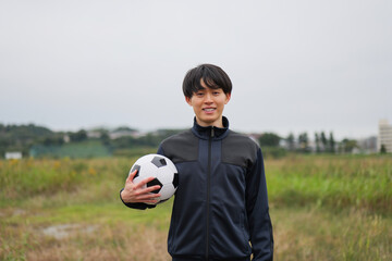 サッカー選手の笑顔のポートレート © monzenmachi