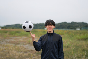 サッカー選手の笑顔のポートレート © monzenmachi