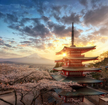 Fujiyoshida, Japan Beautiful view of mountain Fuji and Chureito pagoda at sunset, japan in the spring with cherry blossoms