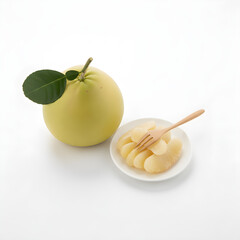 Pomelo Fruit Whole fruit with attached leaf and a serving of peeled segments with a wooden fork