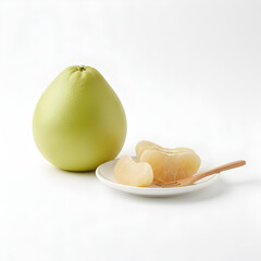 Pomelo Fruit Single whole fruit with a small plate of peeled segments and a wooden fork
