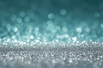 Fototapeta premium Silver Glittering Texture with Turquoise Bokeh Background for Festive and Celebration Glamour
