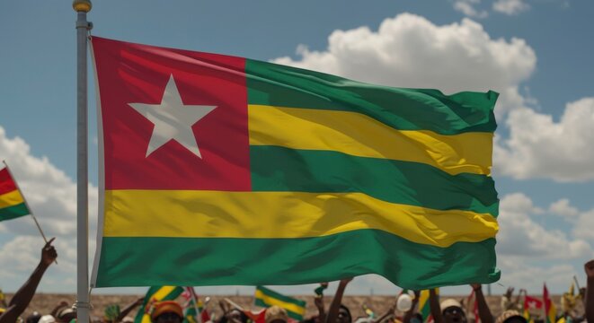 The national flag of Togo waving proudly, symbolizing the country's identity and independence with