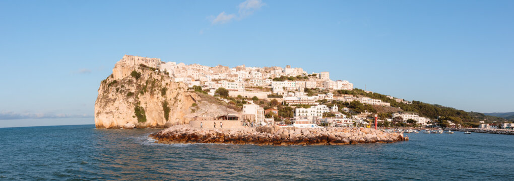 Town and harbour of Peschici at sunset, Puglia, Italy