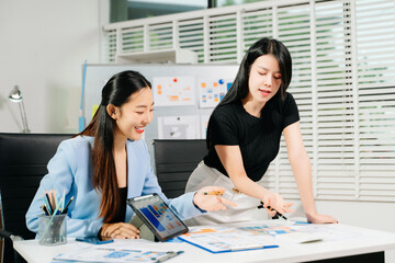 UX UI designers collaborating on mobile app wireframes, showcasing teamwork, creative planning, and modern startup design