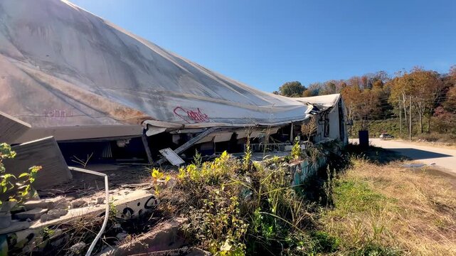 building damaged in asheville nc, north carolina one year after hurricane helene