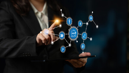 A business professional interacts with a futuristic digital interface, showcasing data connections and innovative communication strategies in a modern workspace. Tessel