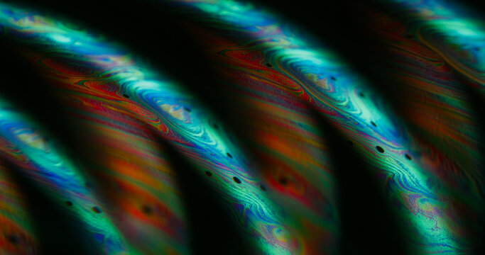 Blur substance spill. Chemical ink. Blue orange purple color bubble black curve emulsion floating on abstract acrylic neon light art background.