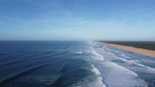 amazing beach le penon in france, nice waves rolling to the beach, drone shot