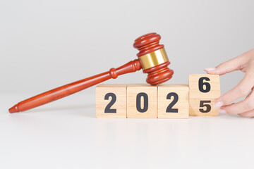 2025 end year to Happy New Year 2026 with judge gavel on table. Law, lawyer, judgment, justice...