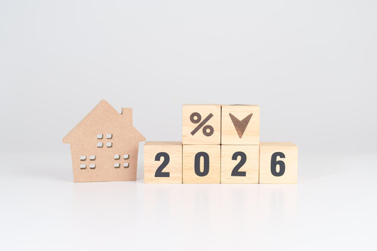 2026 New Year with percentage change to UP and Down arrow with Home model. Real estate Mortgage, Refinance, House loan and debt, Interest rate, Insurance, Financial and Property Tax
