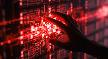 An artistic representation of a human hand interacting with a digital interface, awash in a dramatic red hue. It captures the essence of futuristic technology.
