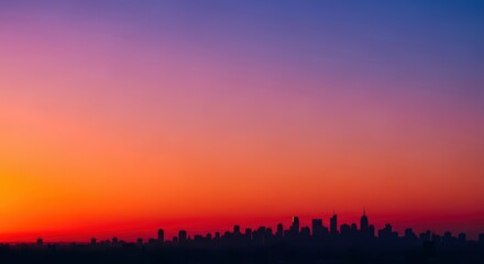 Fototapeta premium Vibrant sunset over city skyline with colorful gradient sky