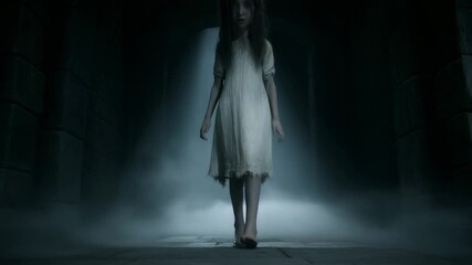 A ghostly girl in a dimly lit, eerie hallway, creating an atmosphere of suspense and mystery. The image evokes a sense of haunting with a chilling scene  Stock Video