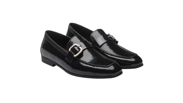 Modern black leather loafers with silver buckle, perfect for professional style and sleek fashion, add sophisticated flair to your wardrobe collection Isolated on white or transparent PNG.