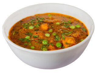 Delicious paneer peas curry served hot in white bowl