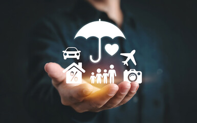 Hand holding an umbrella with various icons representing different types of insurance, including family, home, car, travel, and photography, symbolizing protection and security