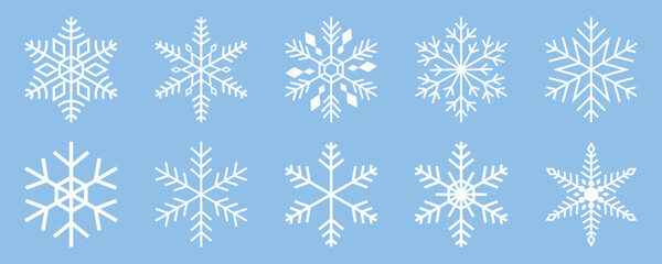 Collection of minimalist white snowflake vector icons with detailed geometric symmetry on light blue background showing winter and christmas decorative design elements