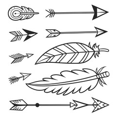 Set of hand drawn feathers and arrows isolated on