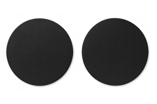 Two black circular drink coasters, blank template mock-up, top view, transparent background - Powered by Adobe