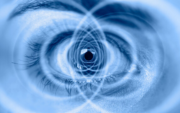 Fototapeta Hypnosis Spiral in eye with vertigo -  Image of abstract spiral eye 