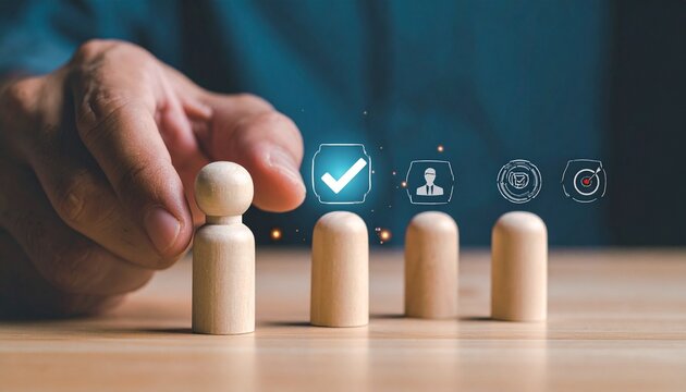 Hand selecting wooden figure with digital icons above, symbolizing approval, recruitment, and identity targeting.