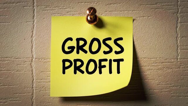 Yellow sticky note pinned to a textured beige wall with the words Gross Profit, ideal for finance, business, and investment concepts.