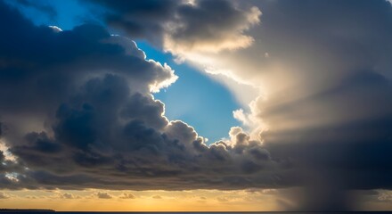 Dramatic sky with clouds and sunlight breaking through, creating a beautiful and dynamic natural scene during daytime
