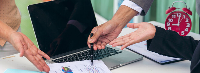 Banner Two businesspeople meeting work at office desk. Teamwork partners team with Business strategy chart graph, infographic financial report. Team partner planning excel stat report with copy space