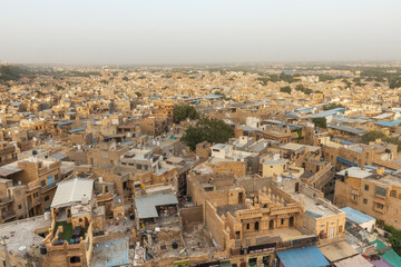 Aerial view of Jaisalmer City in Rajasthan, showcasing its dense maze of houses and historic architecture.