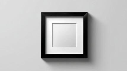 Square picture frame isolated on a wall