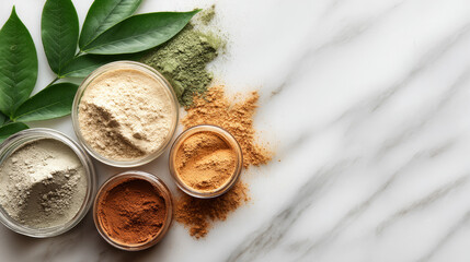 “Flat lay of cosmetic clay products with dry powder and mixed clay mask, styled with a green leaf on a marble surface.”