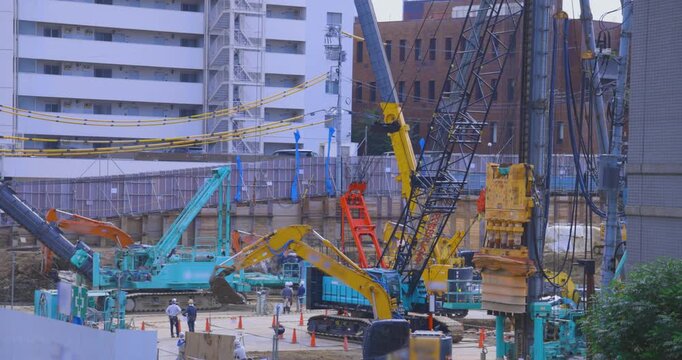 A cityscape of moving crane at the under construction in Tokyo