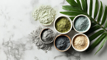 “Flat lay of cosmetic clay products with dry powder and mixed clay mask, styled with a green leaf on a marble surface.”