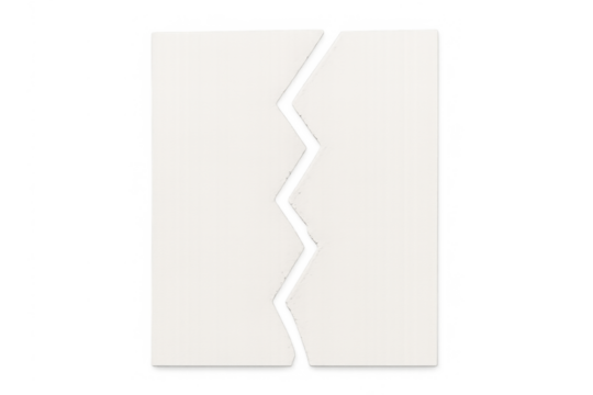 White paper sheet ripped vertically in two pieces with a jagged, zigzag tear, symbolizing separation, disagreement, or struggle