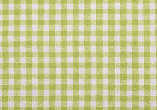 A vibrant green gingham pattern adds a touch of classic charm, perfect for spring and summer designs and cheerful backgrounds