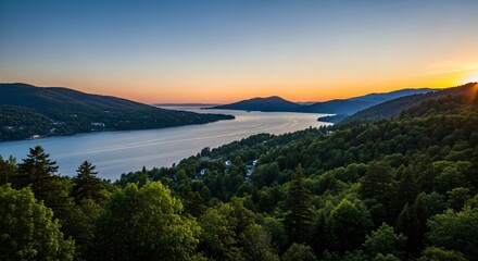 the sun is setting over a lake surrounded by trees