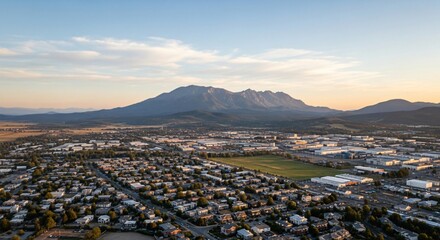 a city with mountains in the background