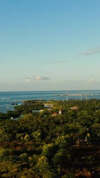 Aerial view of Olango Island with sunset reflection. Lapu-Lapu, Philippines. Cebu. Vertical view.