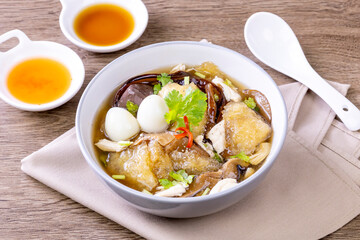 delicious  fish maw soup on the wooden table, Asian food, chinese food