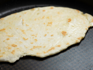 Bread baking in a pan