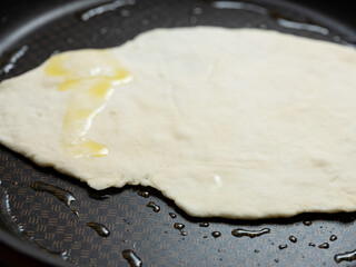 Bread baking in a pan