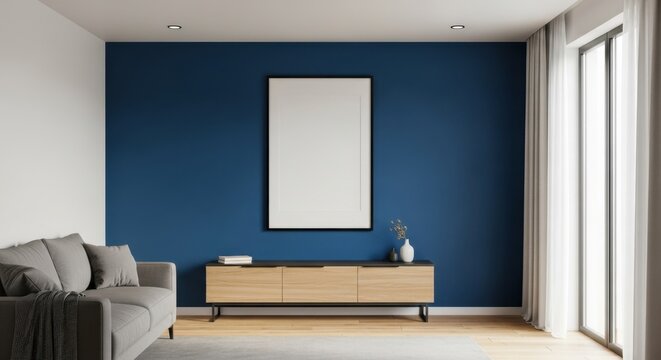 Modern minimalist living room interior with blue accent wall and natural light
